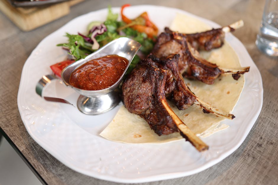 Guinness-marinerte lammeskiver på grillen