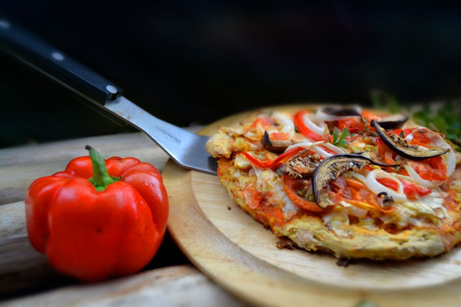 Blomkålspizza med mozzarella, grønnkål og sitron