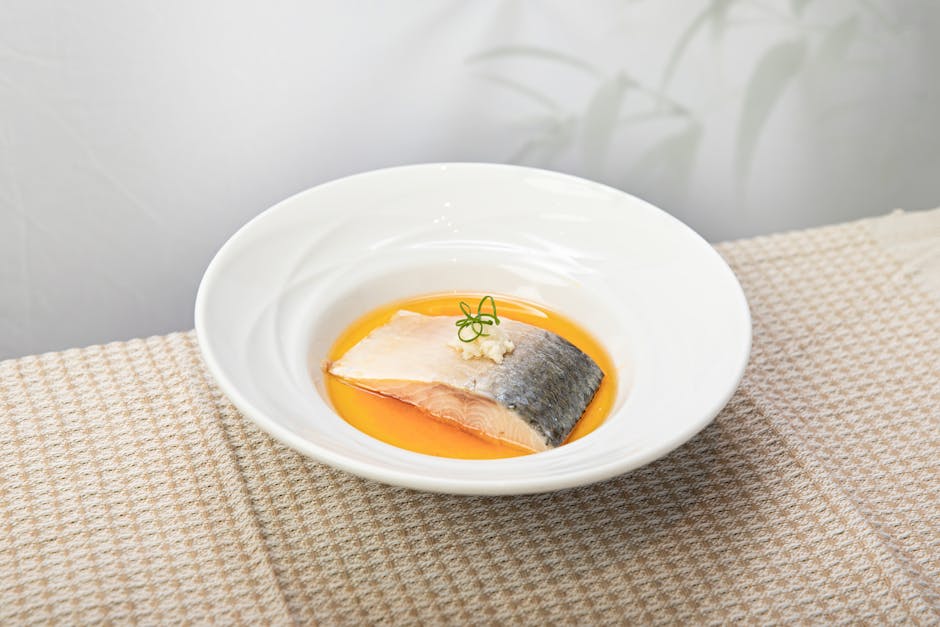 Dampede fiskefileter med vårløk- og ingefærolje