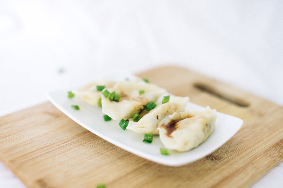Dampede dumplings med ingefær- og gressløk-ponzu