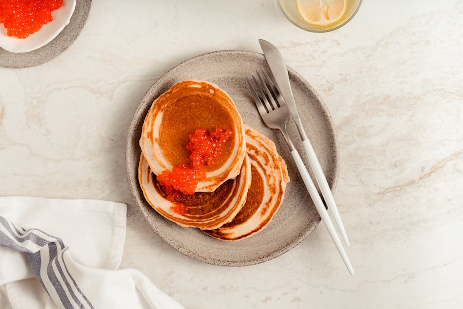 Malangapannekaker med kaviar og vodka-spisskummen-saus