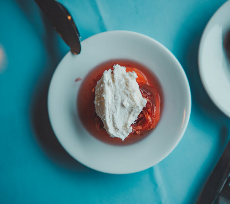 Nektarinkompott med kardemomme og krem