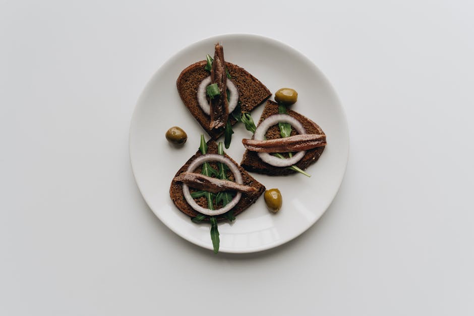 Sardine- og bønnebruschetta med ruccola