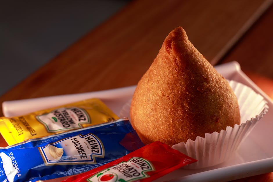 Små brasilianske Coxinha med kylling og mais