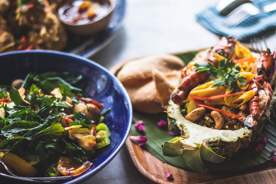 Rød karri med hummer og ananas