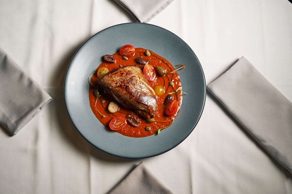 Langtidsstekt lammelår med tomat, oliven og aioli