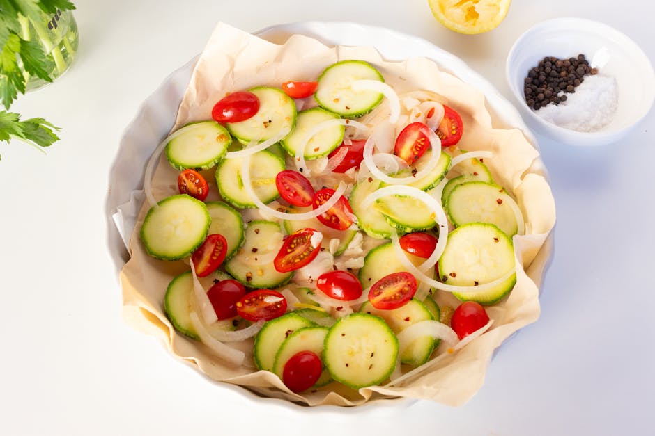 Orange roughy med ruccola, hvitløk og tomater i papilotte