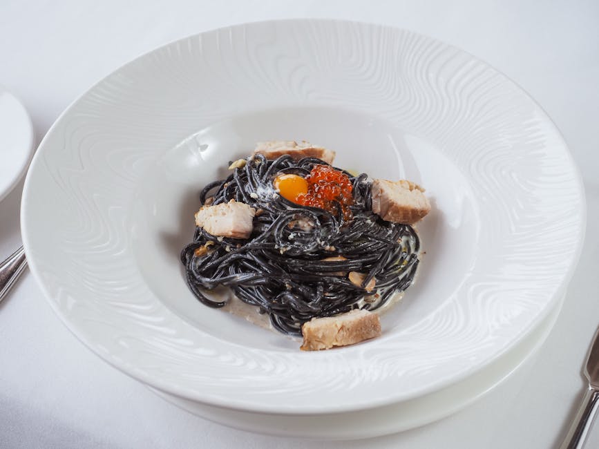 Blekksprutpasta med reker, nduja og tomat