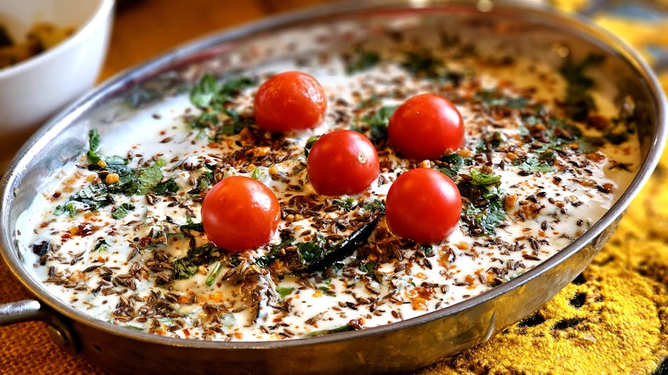 Ristet blomkål med cuminfrø, saltet yoghurt, mynte og granateplekjerner