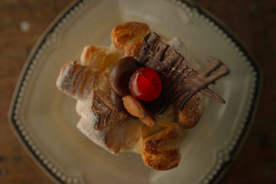 Soufflé av butterdeig med appelsinkrem og karamellsaus