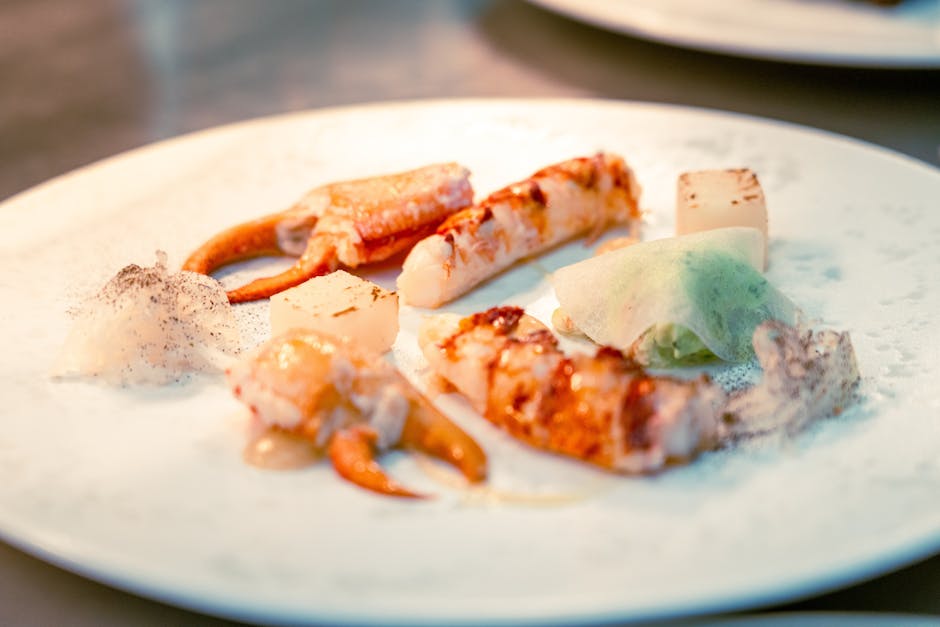 Hummer- og tunfiskdumplings med trøffelskum