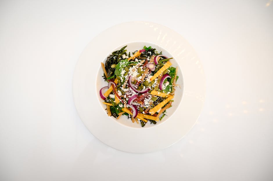 Grønnkål- og fetaostsalat med gresskarkjerner