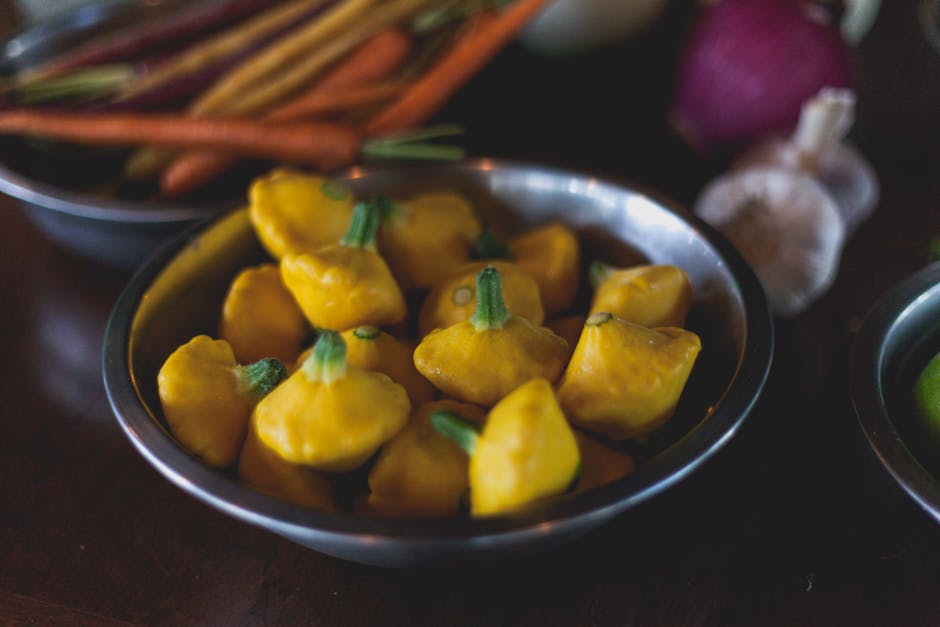 Fylte gule squash med stuede tomater