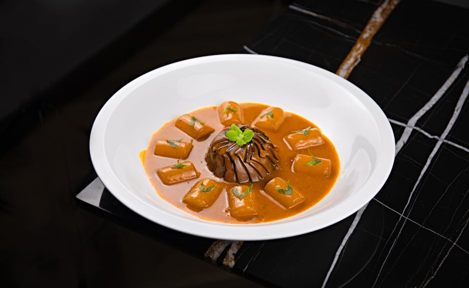 Mørk sjokoladeterine med appelsinsaus