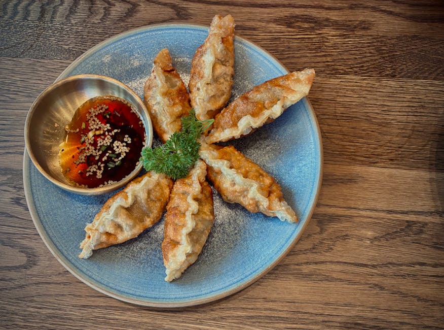 Hummerdumplings med rød karri-kokoskrem