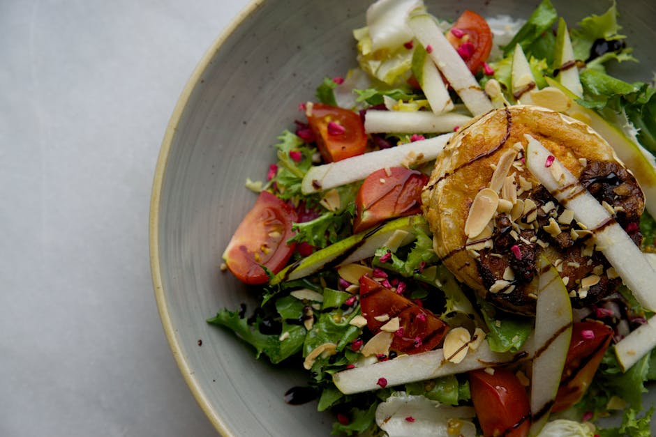 Løvetannsalat med sprøstekt bacon og geitostblomster