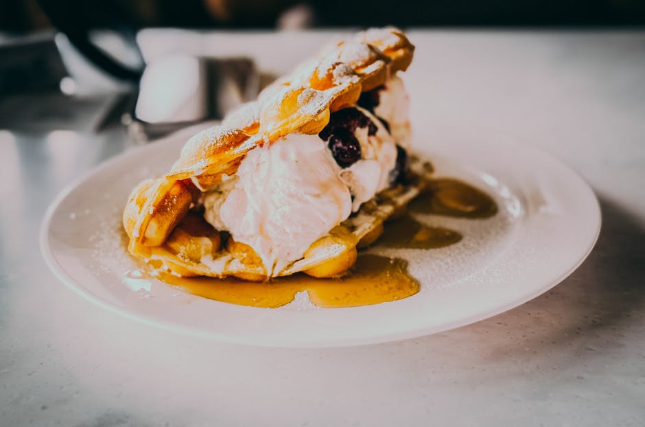 Kokos- og maisis med brunsukkersirup og peanøtter