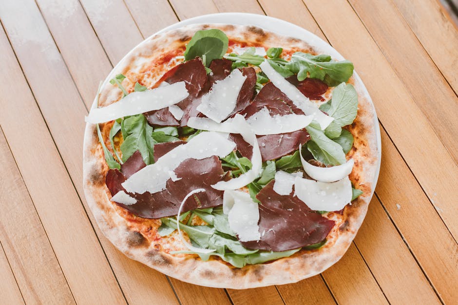 Bresaolaruller med ruccola, fennikel og Manchego