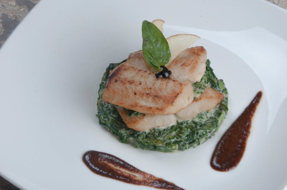 Potetinnpakket kveite med sautert spinat