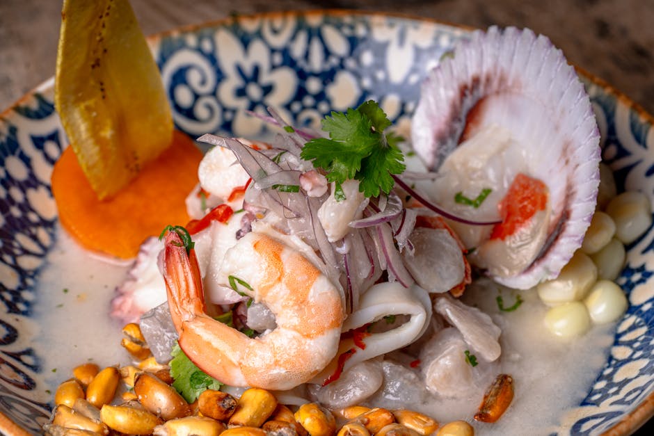 Ceviche med kamskjell, østers og reker