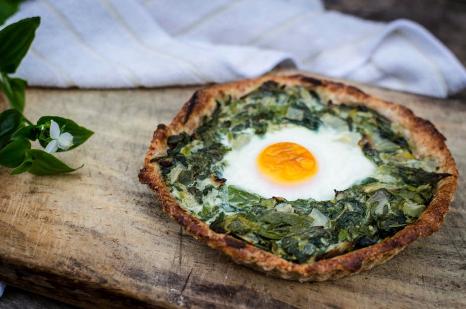 Åpne egg Florentine med spinat og ost