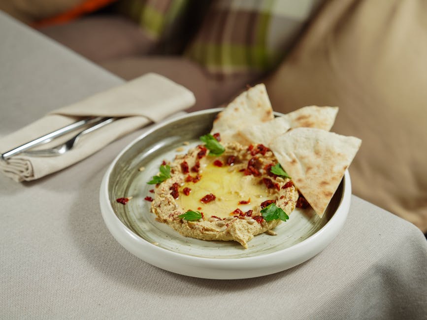 Kremet spinat-, artisjokk- og bacon-dip med sprø pitabrød