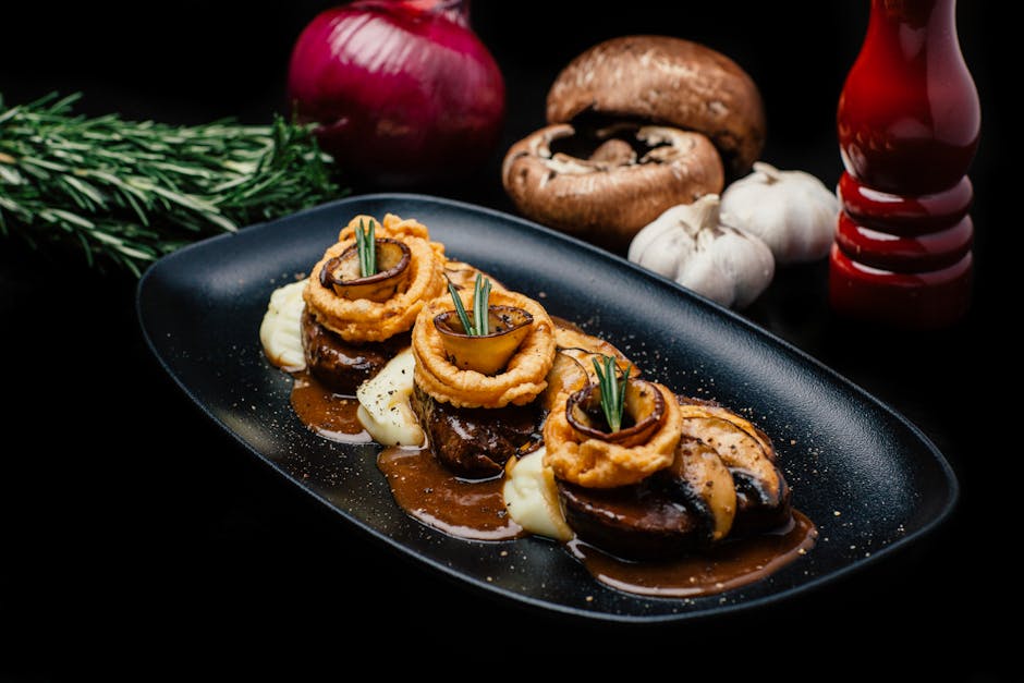 Cheddar- og løkpølser med potetmos og Guinness-saus