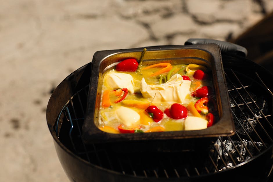 Grillede, ovnsbakte røde paprika fylt med ost