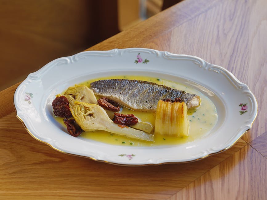 Steinbittfilet med fiken- og maiskrem, lakrisbuljong og fylt artisjokk