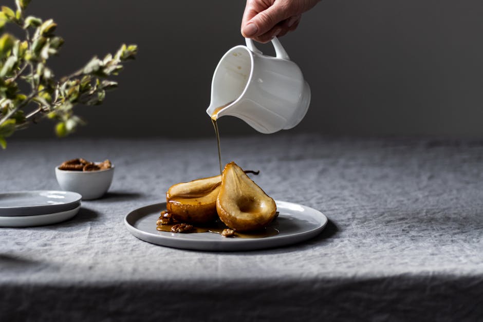 Posjerte ferskener i vaniljesirup