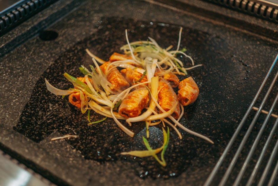 Sizzling svart bass med ingefær og soyasaus