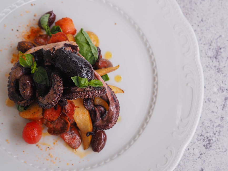 Blekksprut Veracruz med tomat og paprika