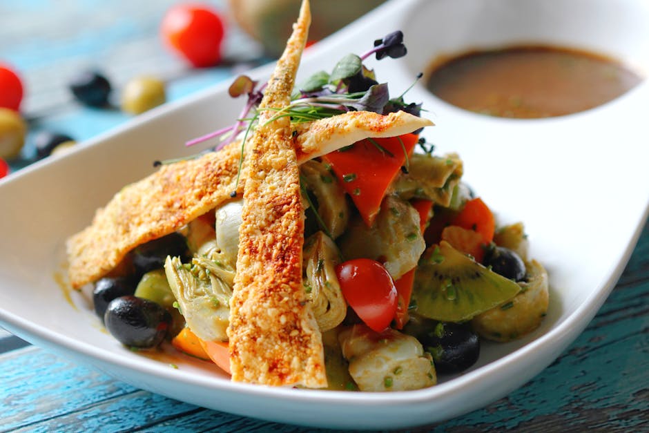 Artisjokker med tomat- og baconvinaigrette