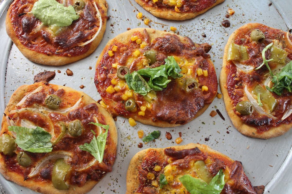 Pizzettas med oliventapenade og pecorinoost