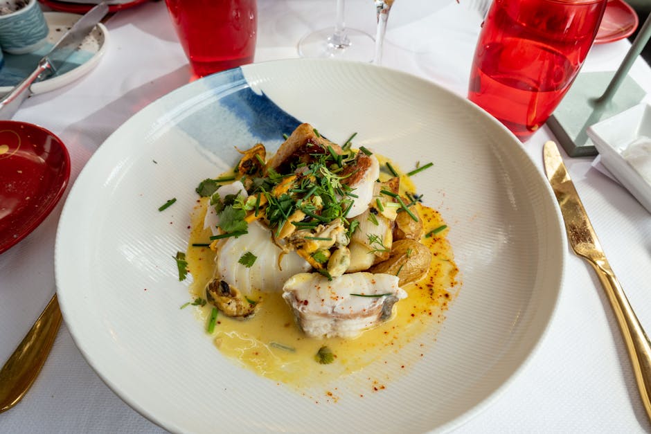 Hake med hasselnøtter, kapers og persille