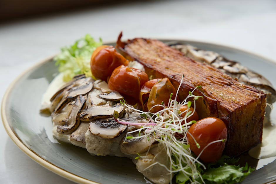Torsk med sopp- og urtepanering og tomatkompott