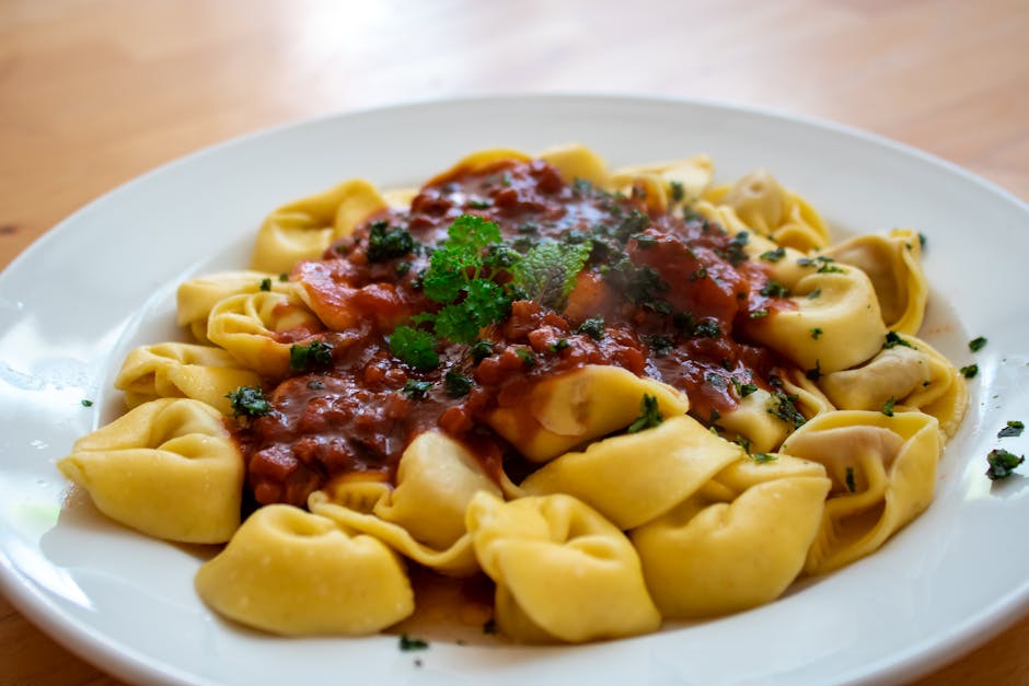 Ricotta- og spinattortelloni i tomatsaus