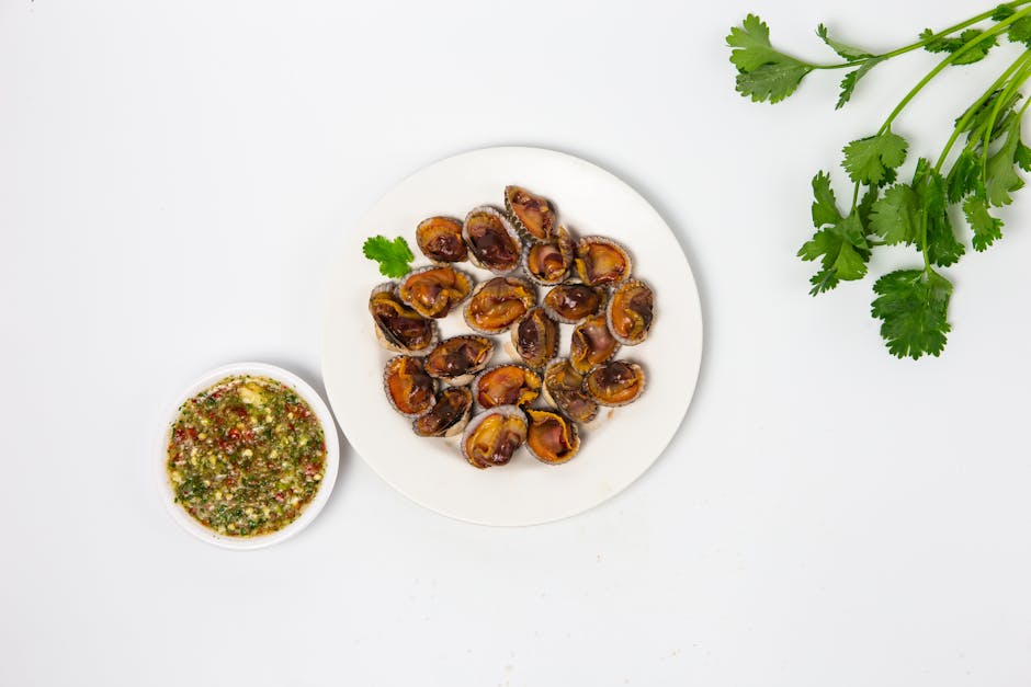 Dampede hjerteskjell i ingefær- og korianderbuljong